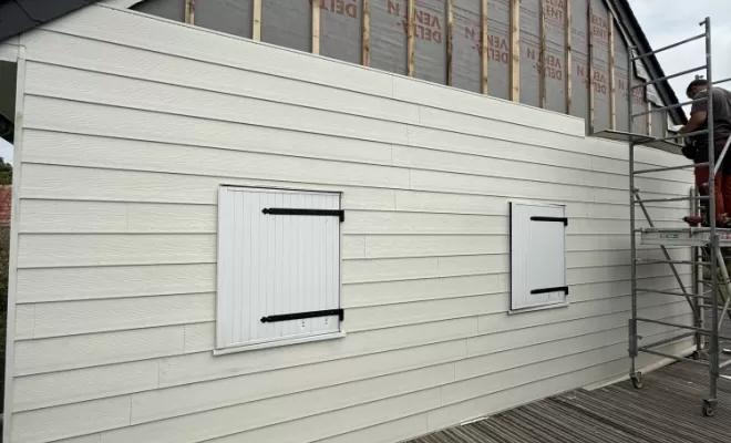 Habillage d'un pignon en bardage PVC à Lorient par COUVREUR.TA, Lorient, COUVREUR.TA