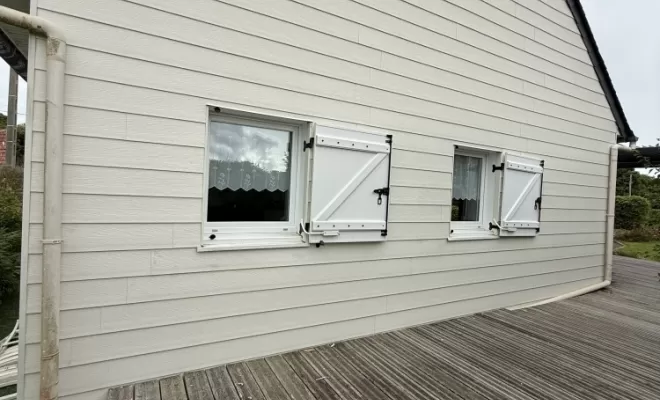 Habillage d'un pignon en bardage PVC à Lorient par COUVREUR.TA, Lorient, COUVREUR.TA